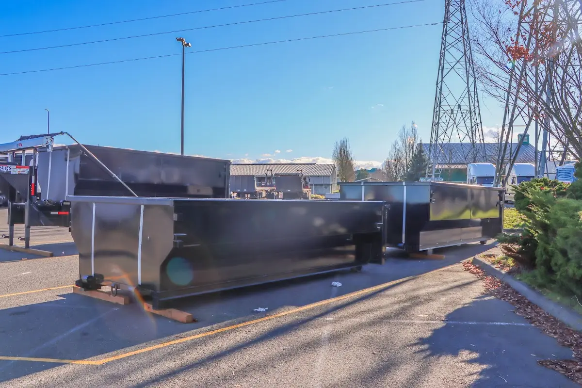 Roll-off dumpster ready for waste disposal at job site for 2 Yard Dumpster Rental in Manteca